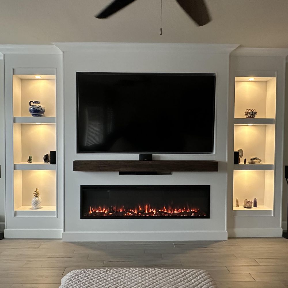 media wall with fireplace and shelves